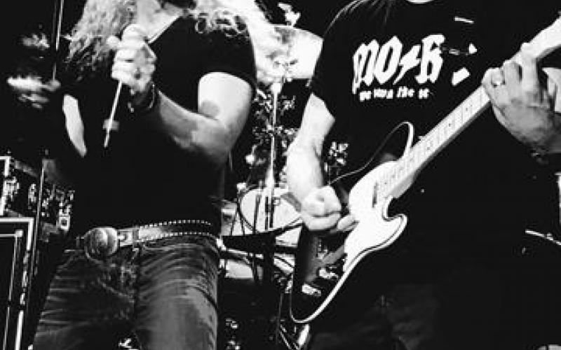 Great White singer Mitch Malloy, left, and founding member and lead guitarist Mark Kendall performing in 2019.